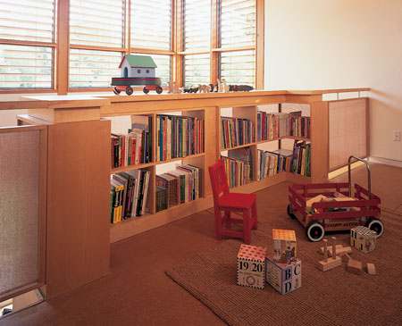The children’s play area articulates the home’s open design and allows plenty of light in through the windows.